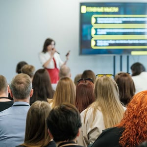 00-business-seminar-with-a-speaker-presenting-to-a-large